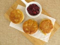 Small crumpets with cranberry jam Royalty Free Stock Photo