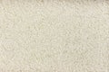 Small crushed rice background or texture Royalty Free Stock Photo