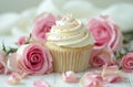 small cupcake surrounded by pink roses and white frosting Royalty Free Stock Photo