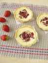 Small curd cheese cakes with strawberry jam