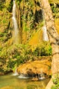 Small current fall gushes down dazzling white in Dai Yem Pink Blouse waterfall, Moc Chau, Vietnam Royalty Free Stock Photo