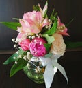 Flowers cute bouquet with roses and alstroemerias pink white green, wooden box