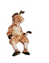 Small cute kid in amazing giraffe costume isolated on white Royalty Free Stock Photo