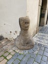 Small cute statue of Golem in Prague, Czech Republic