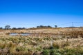 Small dam in the countryside under clear blue sky in Emmaville, New South Wales, Australia