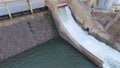 Water flowing over a power generation dam