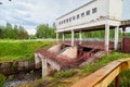 A small dam with gateway on small river in forest Royalty Free Stock Photo