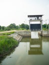 Small dam in a narrow canal in Thailand.