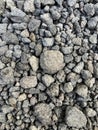 Small dark stones on a rocky gravel path Royalty Free Stock Photo