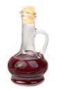 Small decanter with red wine vinegar isolated on w Royalty Free Stock Photo