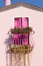 Small Balcony on a Pink House Royalty Free Stock Photo