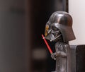 small decorative doll representing darthvader