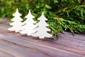 Small decorative white wooden christmas tree. New Year concept, gift from kraft paper Royalty Free Stock Photo