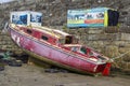 A small derelict boat in Mullaghmore Harbour Ireland Royalty Free Stock Photo