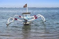 Small designed boat tied with rope in a seashore with peaceful exotic weather Royalty Free Stock Photo