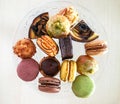 Small dessert pastry with macaron, top view, soft focus Royalty Free Stock Photo