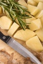 Into small dice cut organic potatoes Royalty Free Stock Photo