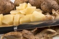 Into small dice cut organic potatoes Royalty Free Stock Photo