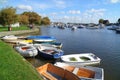 Small dinghies moored at harbourside