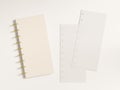 Small discbound planner cover mockup with loose planner inserts