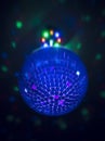 Small disco ball with lights behind Royalty Free Stock Photo