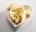 Small dish with heart shaped butter pats