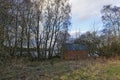 A small Disused and empty Boat house hidden in the undergrowth on the side of Stormont Loch in Perthshire