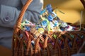 Small dolls from straw in a basket at a fair Royalty Free Stock Photo