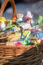 Small dolls from straw in a basket at a fair Royalty Free Stock Photo