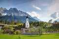 Small domed church with Wetterstein in Grainau village Germany Royalty Free Stock Photo