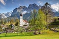 Small domed village church with Wetterstein in Grainau Bavaria Royalty Free Stock Photo