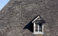 Small Dormer Window in stone roof of Navarrenx Royalty Free Stock Photo