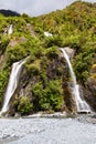 A small double waterfall on the way to Franz Josef Glacier. South Island, New Zealand Royalty Free Stock Photo