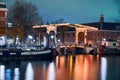 Swing bridge over the canal in Amsterdam at night Royalty Free Stock Photo