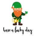 A small dwarf with a red beard and a green checkered hat holds a leaf of clover and a watering can. A postcard with a