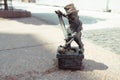 Small dwarf statue on the market square in Wroclaw