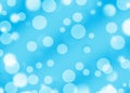 Small e big white bubbles on the blue background Royalty Free Stock Photo