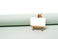 Small easel for mockup. advertising for art or office supplies. stand with an empty sheet of paper