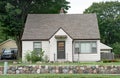 Low Income Urban House with Stone Wall Royalty Free Stock Photo