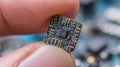 Small electronic chip on fingertip showing complex circuit design microtechnology details, AI generated Royalty Free Stock Photo