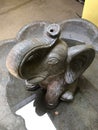 a small elephant structure in bird bath fountain, art sculpture Royalty Free Stock Photo