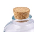 Small empy glass with a cork isolated on a white