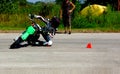 Small engine speed bike rider practice run on asphalt track in rural area Hungary