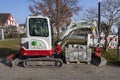 Small excavator for construction work on the promenade of Langenargen
