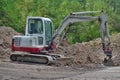 Small excavator, work in the forest, South Bohemia Royalty Free Stock Photo