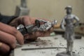 A small factory producing small batches pewter figurines.