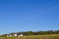 Small family house on green field with blue sky Royalty Free Stock Photo