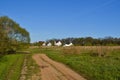Small family house on green field with blue sky Royalty Free Stock Photo