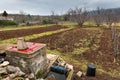 Small farm in Croatia vegetable field, orchard, well in spring