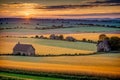 A small farming village at sunset